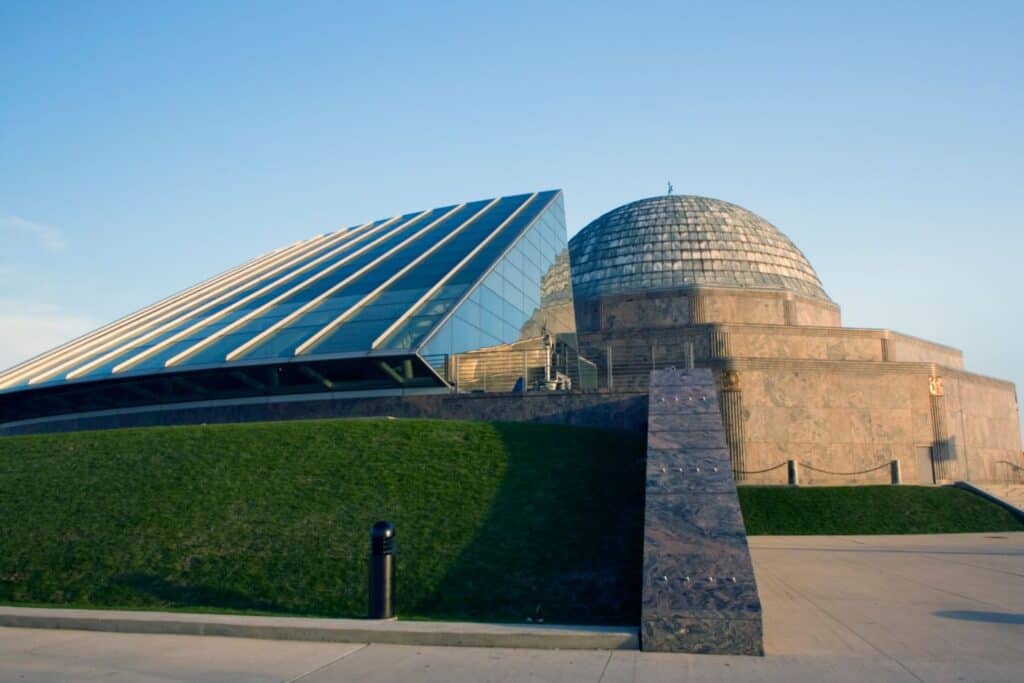 The iconic Adler Planetarium in Chicago with its modern architecture, a perfect educational destination for a couple on their babymoon in Chicago