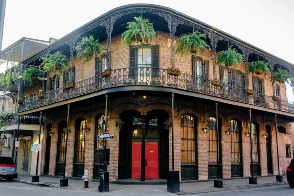 The iconic French Quarter with its ornate balconies and charming streets, a must-visit destination for couples on a babymoon in New Orleans