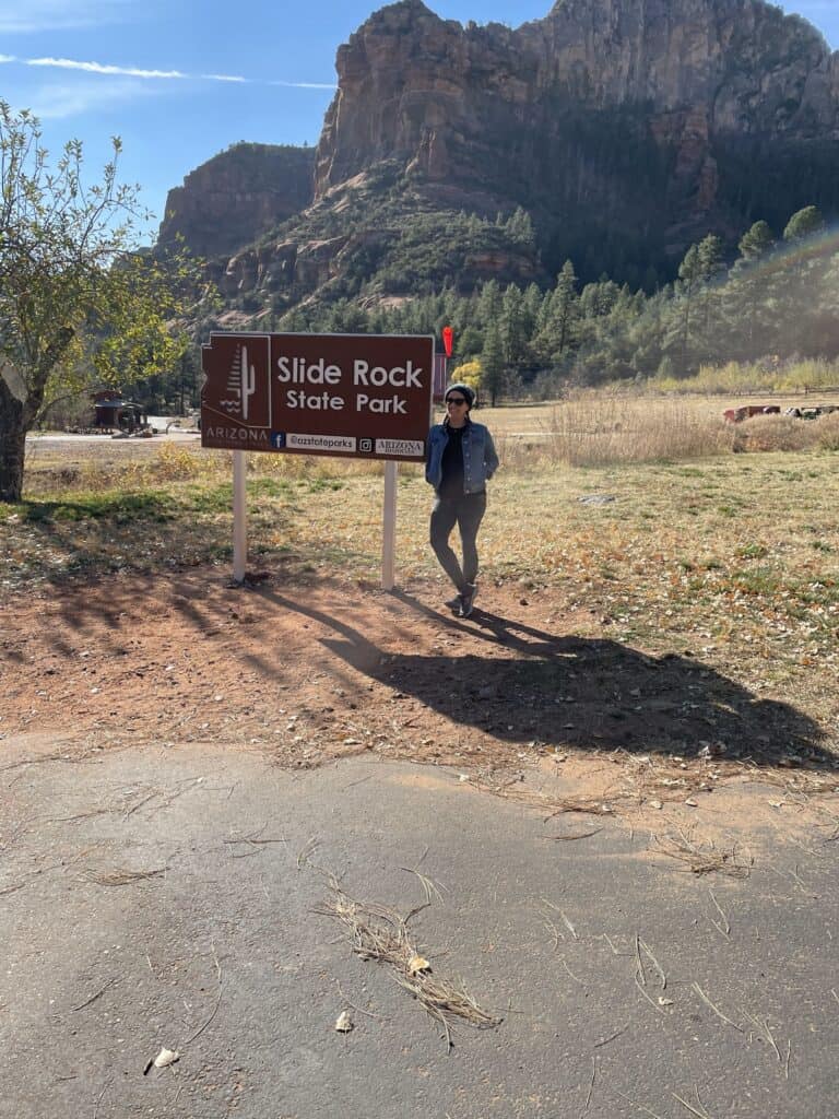 Girl at Slide Rock State Park, Sedona, capturing joyful moments during a vacation