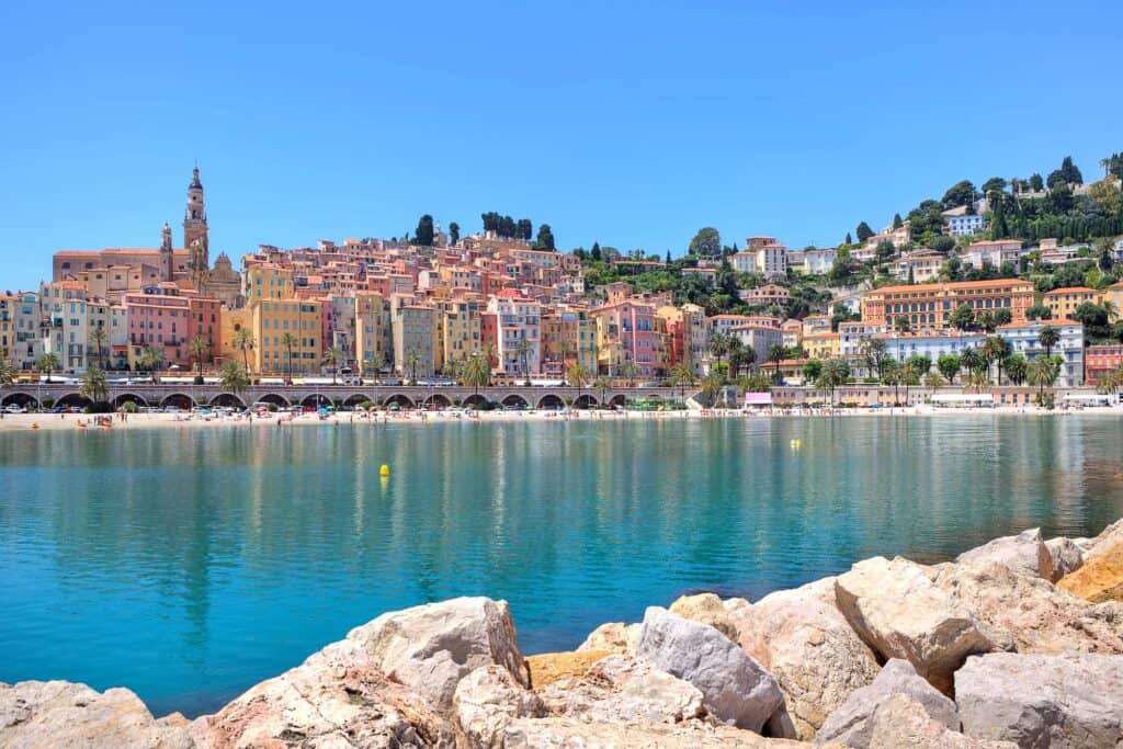 The Colorful coastal city of Menton with the calm ocean in front of the city